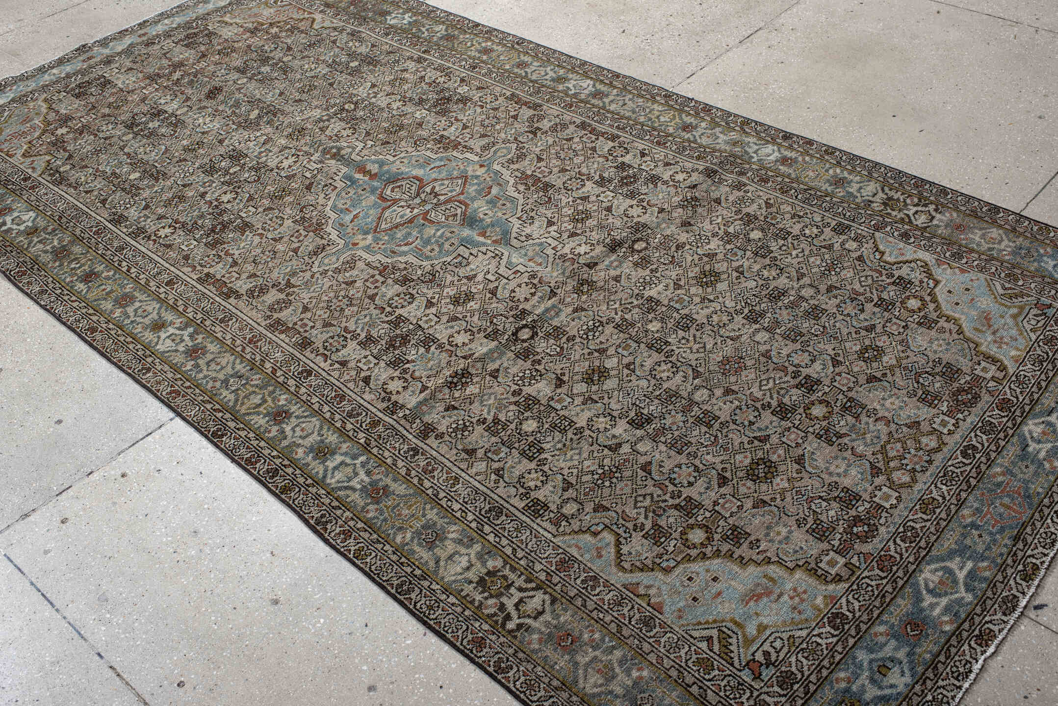 5' x 9' one-of-a-kind handmade vintage Malayer medium size rug. Color palette: ivory, sky blue, brown, rust, charcoal, taupe