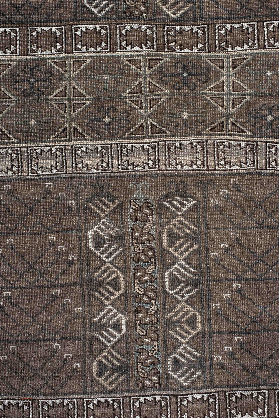 4' x 6' one-of-a-kind handmade vintage Belouch small size rug. Color palette: taupe, brown, ivory, charcoal, camel, slate