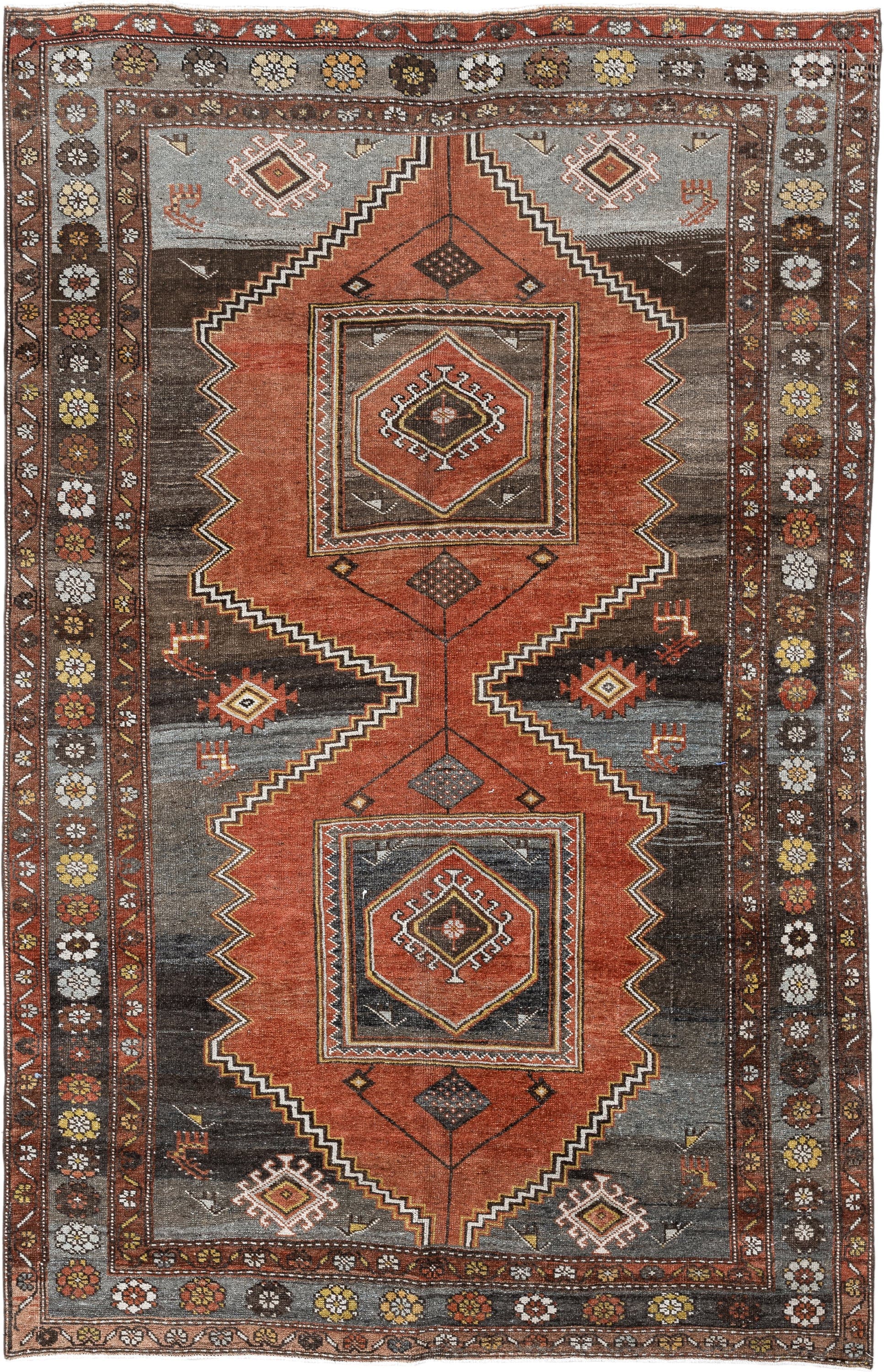 5' x 8' one-of-a-kind handmade vintage Veece medium size rug. Color palette: rust, charcoal, slate, brown, ivory, gold