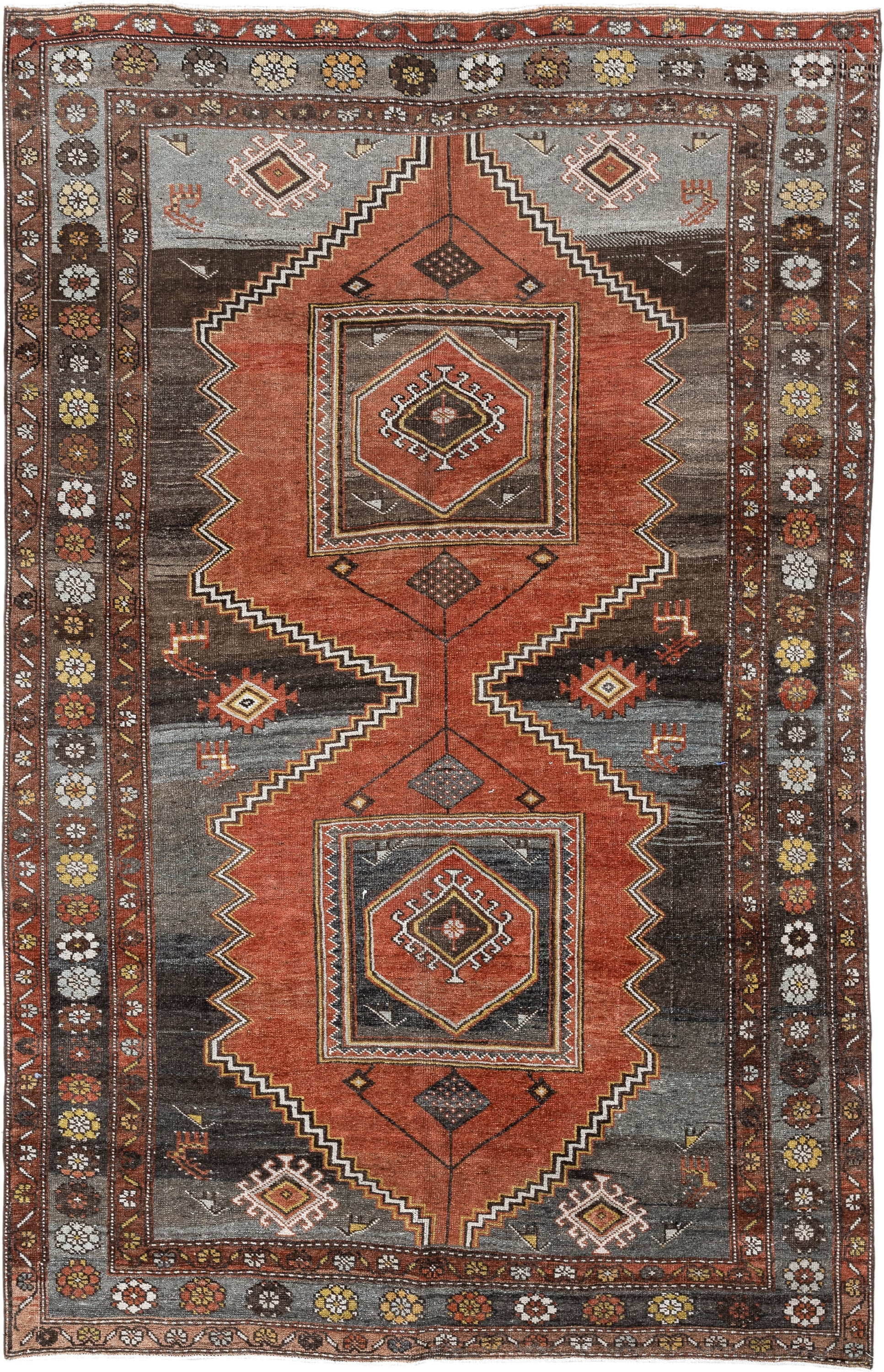 5' x 8' one-of-a-kind handmade vintage Veece medium size rug. Color palette: rust, charcoal, slate, brown, ivory, gold
