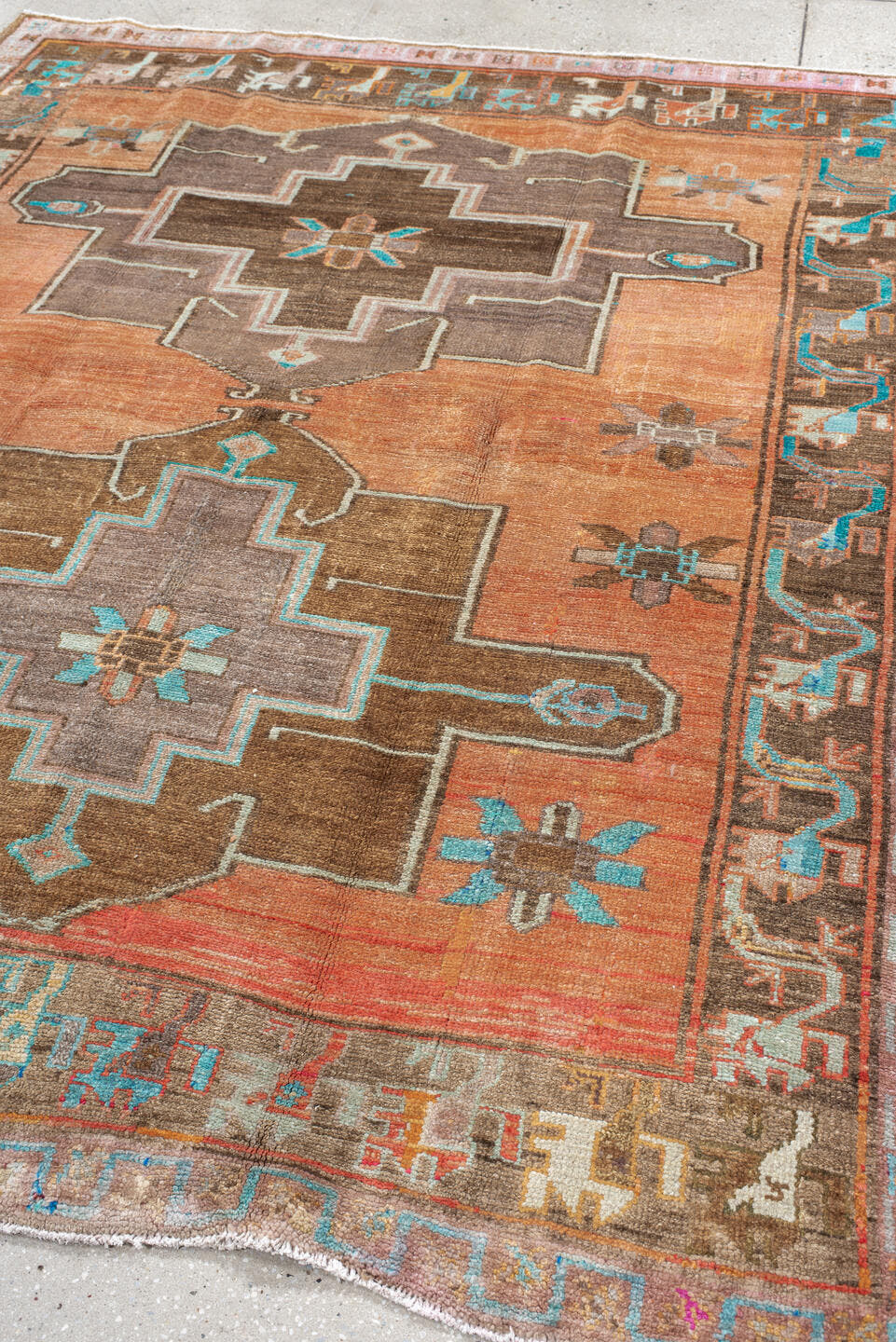 6' x 7' one-of-a-kind handmade vintage Kars rug. Color palette: salmon, taupe, camel, turquoise, ivory, brown, terracotta