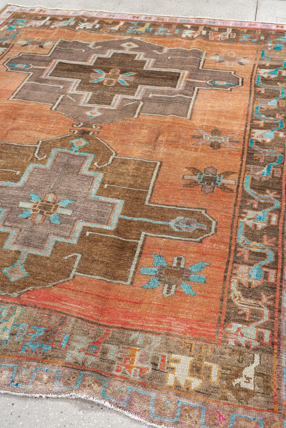 6' x 7' one-of-a-kind handmade vintage Kars rug. Color palette: salmon, taupe, camel, turquoise, ivory, brown, terracotta