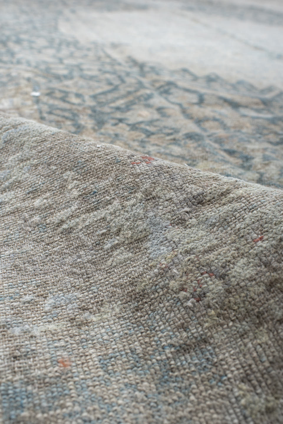 7' x 10' one-of-a-kind handmade vintage Senne large size rug. Color palette: ivory, pale blue, sky blue, taupe, light gray