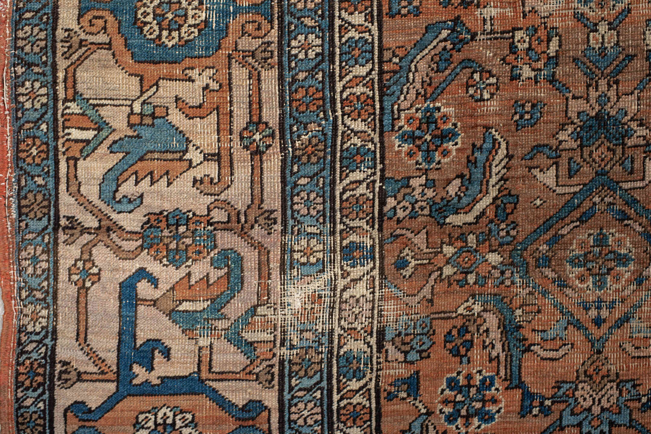 10' x 14' one-of-a-kind handmade vintage Serapi large size rug. Color palette: terra cotta, ivory, blue, beige, camel, slate