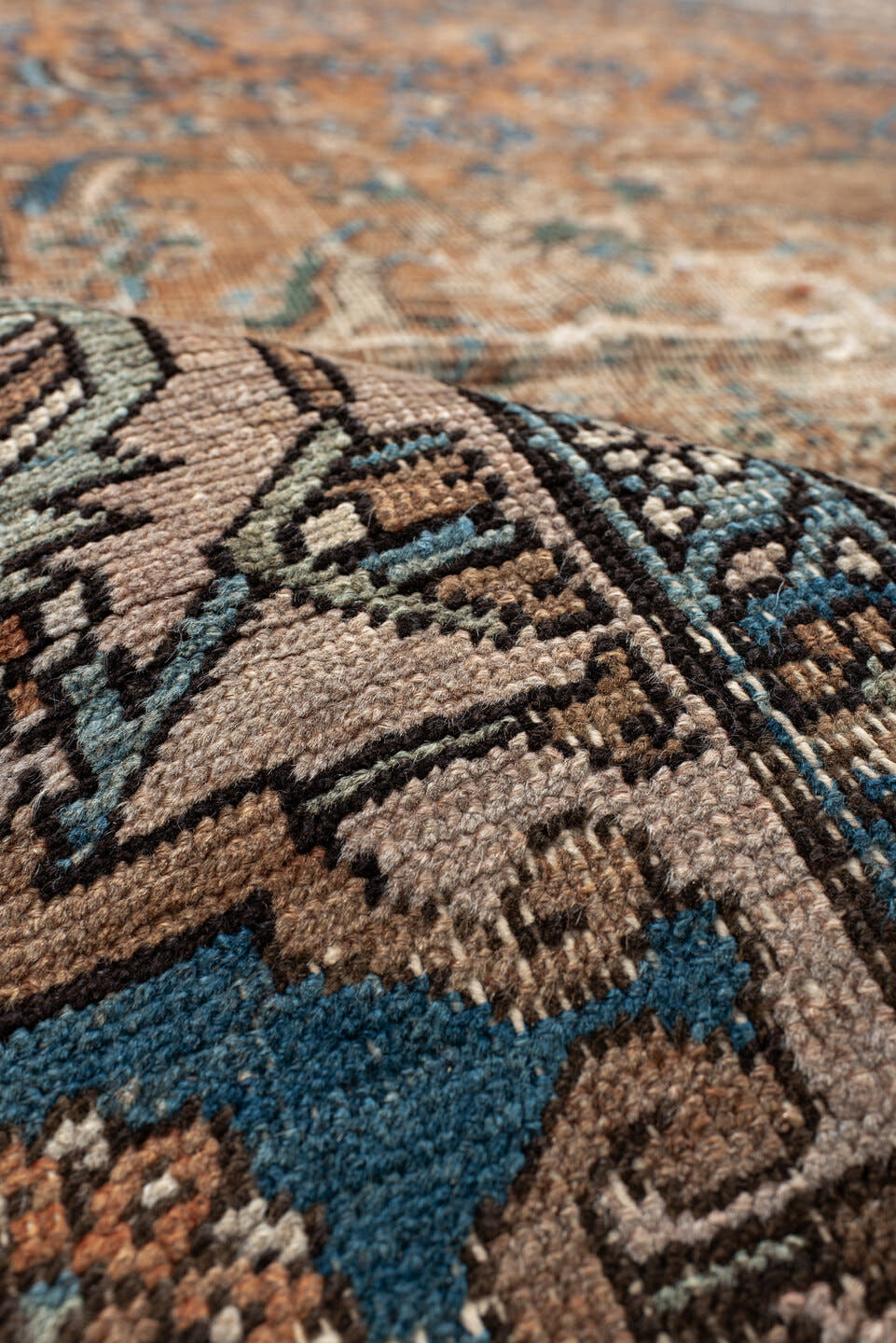 10' x 14' one-of-a-kind handmade vintage Serapi large size rug. Color palette: terra cotta, ivory, blue, beige, camel, slate