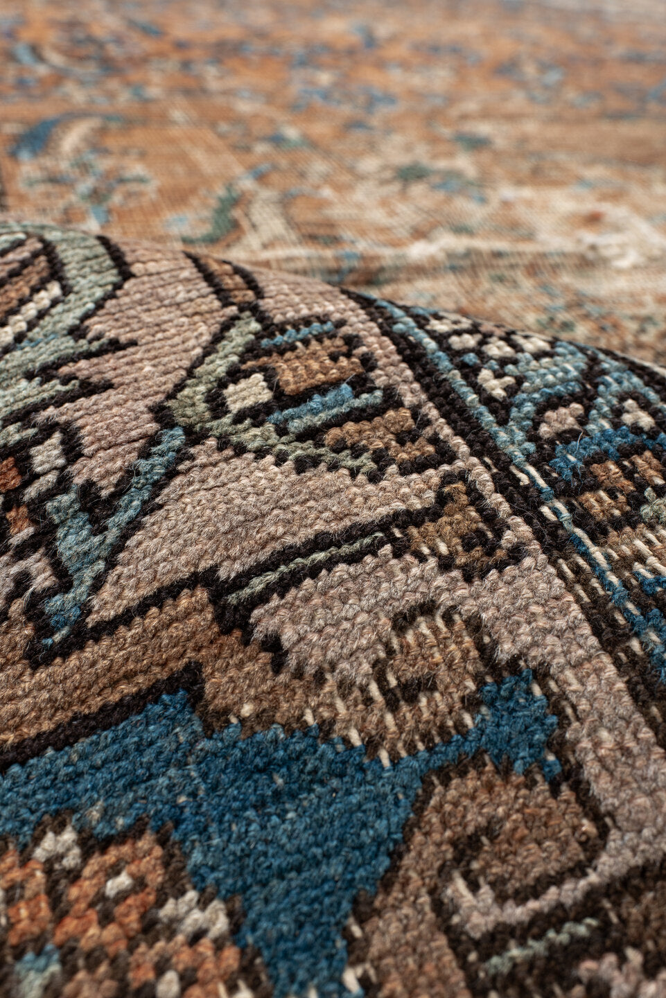 10' x 14' one-of-a-kind handmade vintage Serapi large size rug. Color palette: terra cotta, ivory, blue, beige, camel, slate