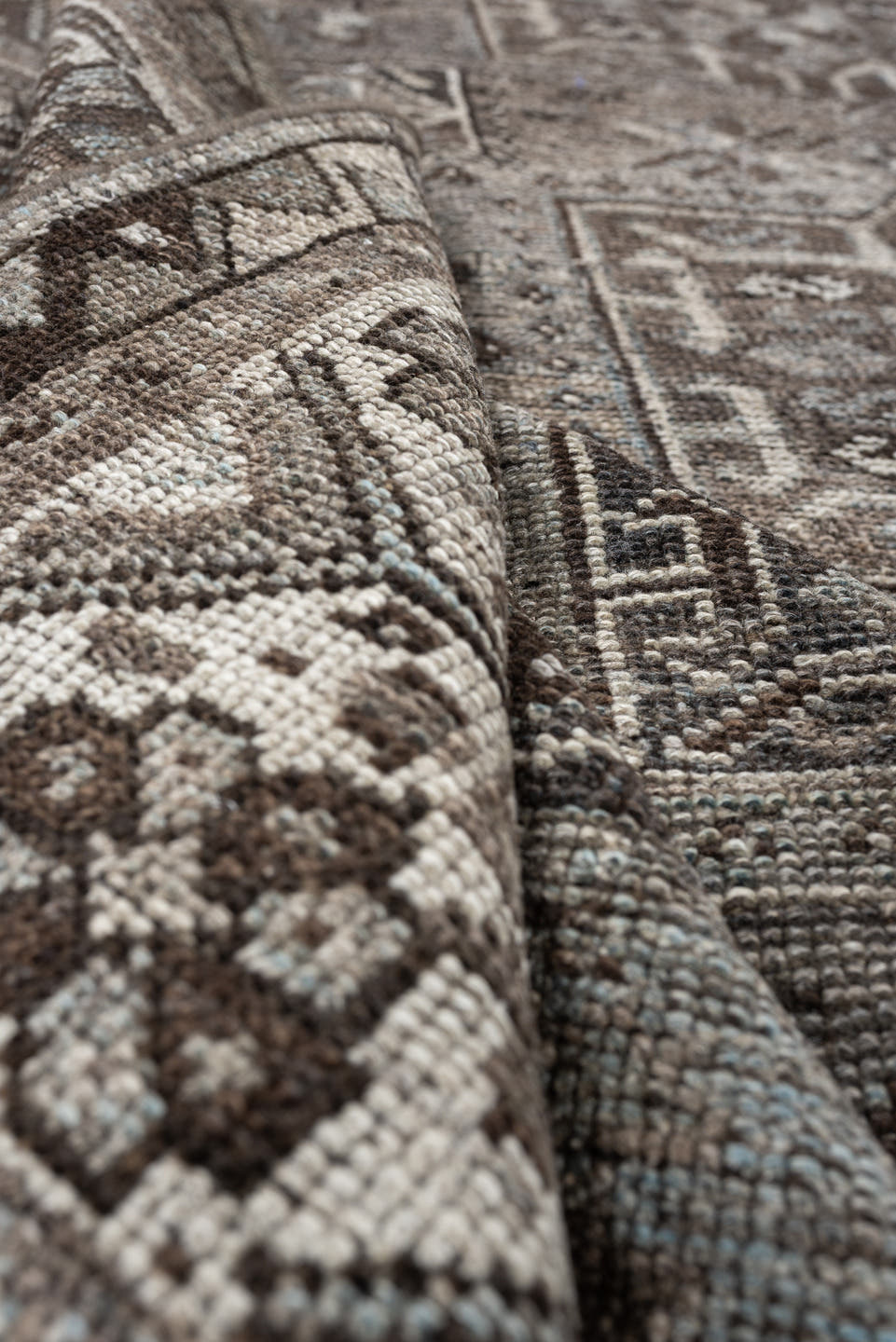5' x 7' one-of-a-kind handmade antique Shiraz rug. Color palette: ivory, blue gray, taupe, brown, charcoal, sage, ochre