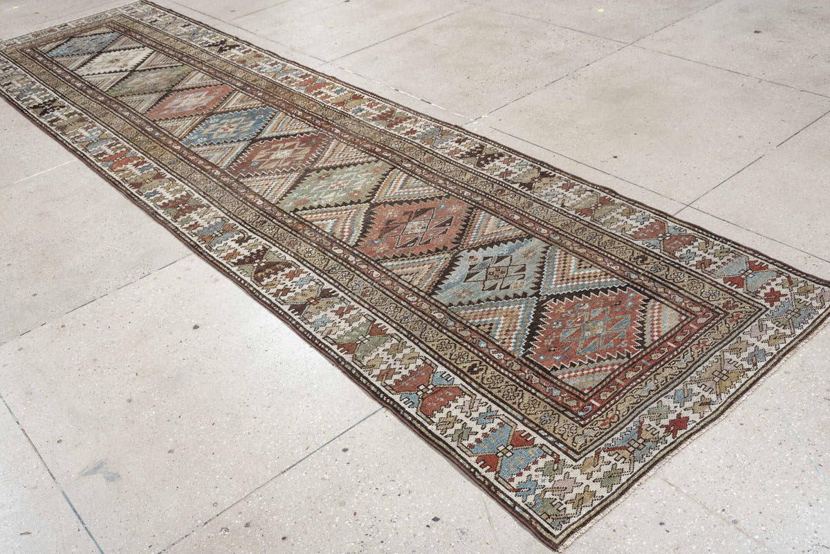 3' x 13' one-of-a-kind handmade antique NW Persian runner rug. Color palette: ivory, taupe, brown, slate blue, sage, rust