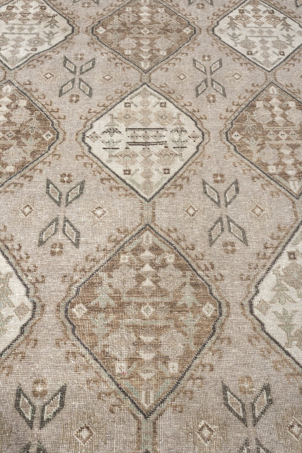 5' x 11' one-of-a-kind handmade antique Ardebil large size rug. Color palette: taupe, ivory, brown, charcoal, beige, camel