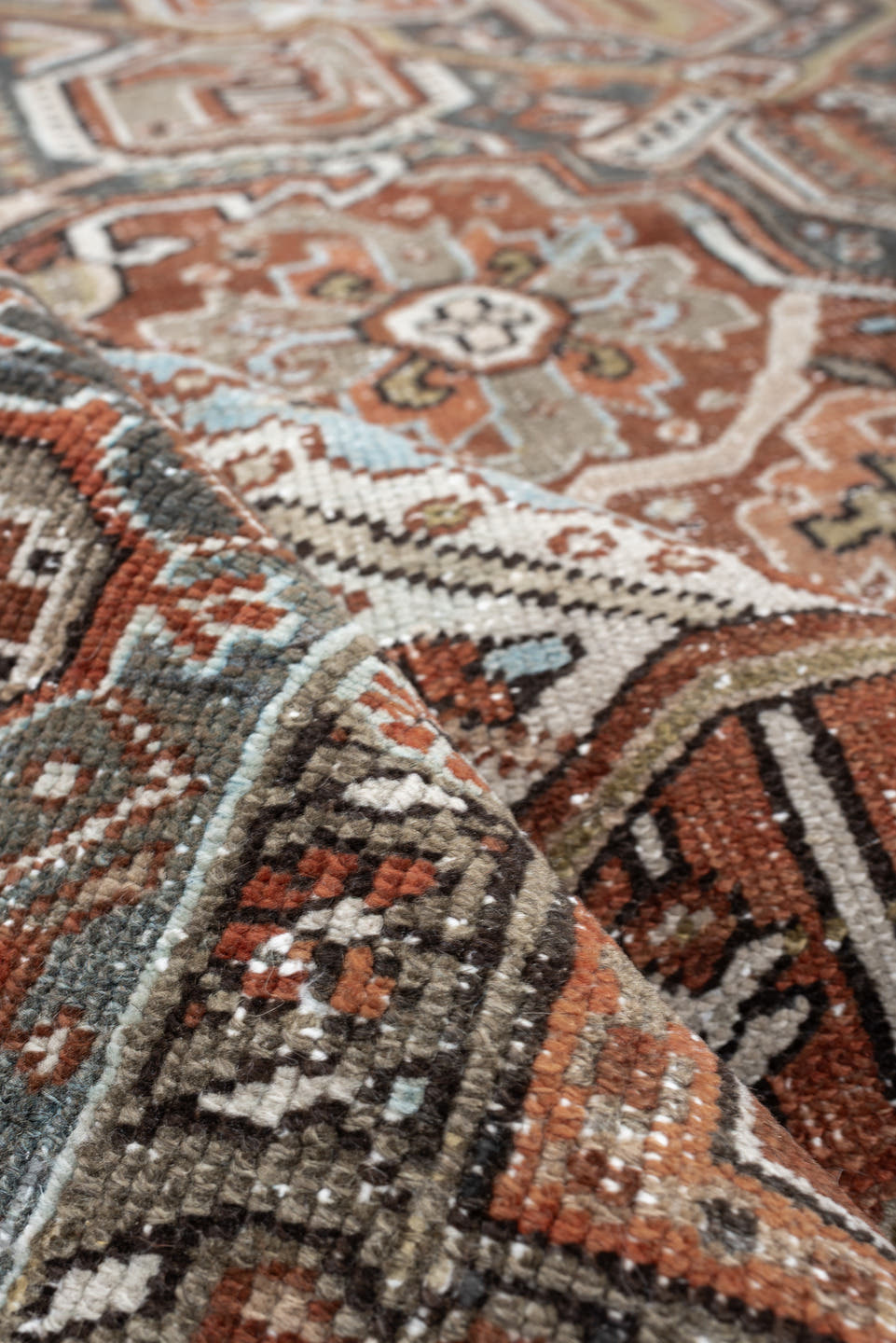 8' x 11' one-of-a-kind handmade antique Heriz large size rug. Color palette: terracotta, blue gray, ivory, charcoal, rust