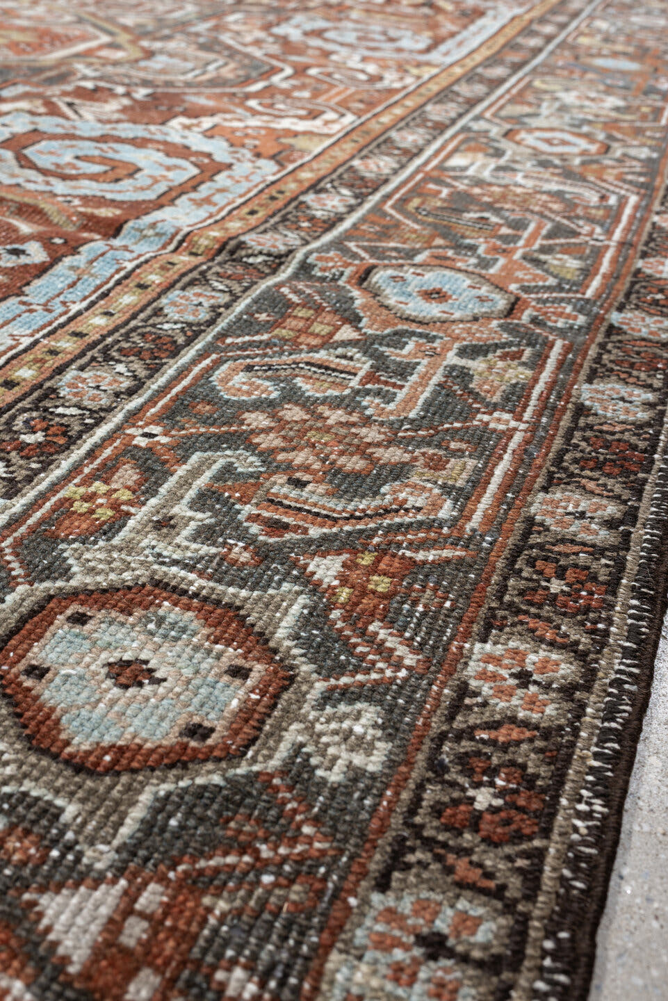 8' x 11' one-of-a-kind handmade antique Heriz large size rug. Color palette: terracotta, blue gray, ivory, charcoal, rust