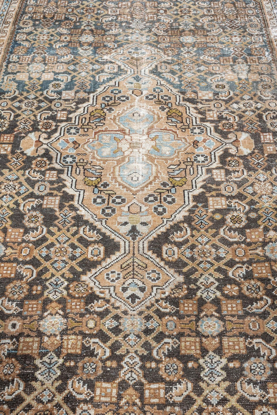5' x 10' one-of-a-kind handmade antique Malayer runner rug. Color palette: charcoal, camel, ivory, powder blue, taupe, rust