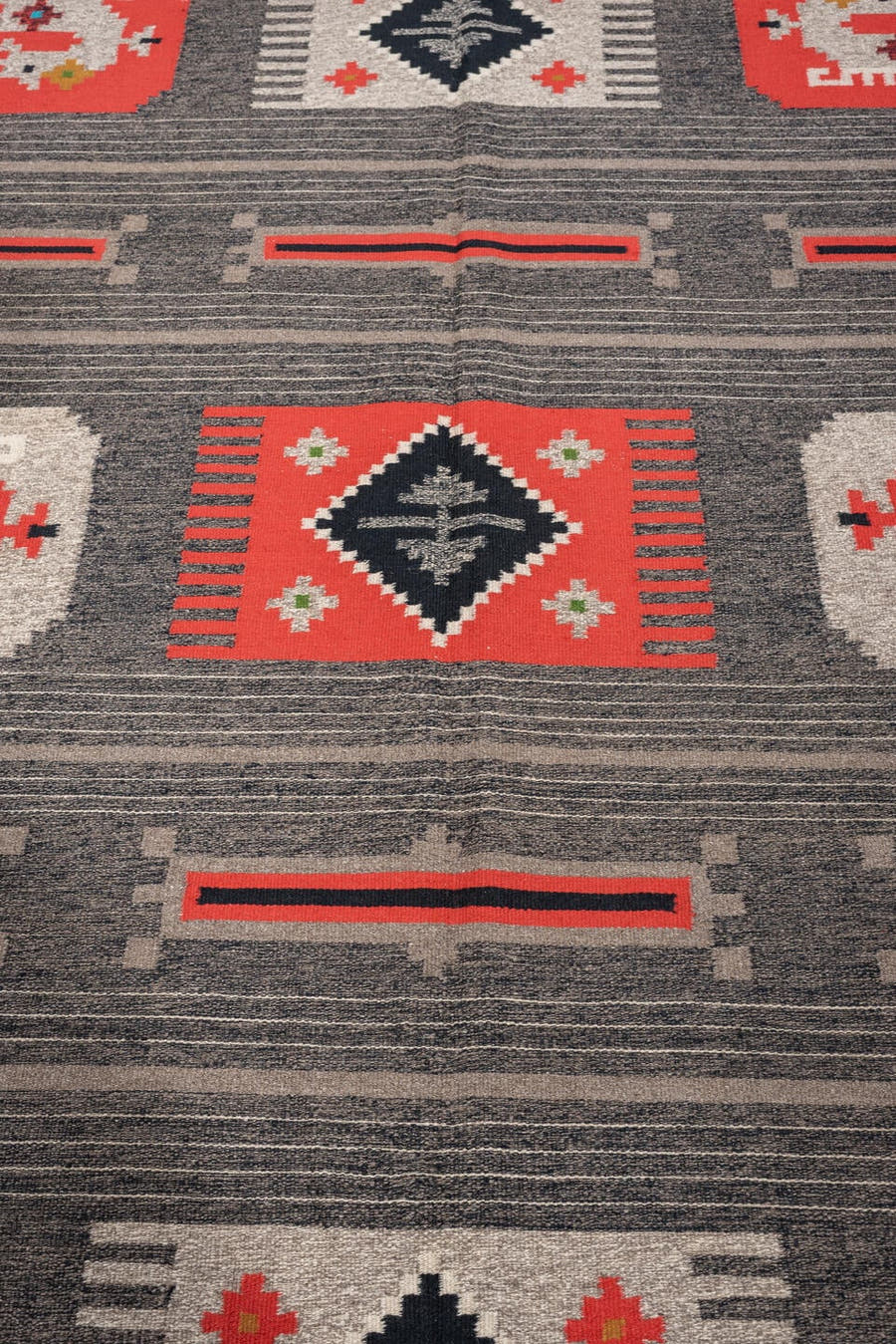 5' x 7' one-of-a-kind handmade antique Scandinavian medium size rug. Color palette: charcoal, coral, ivory, black, taupe