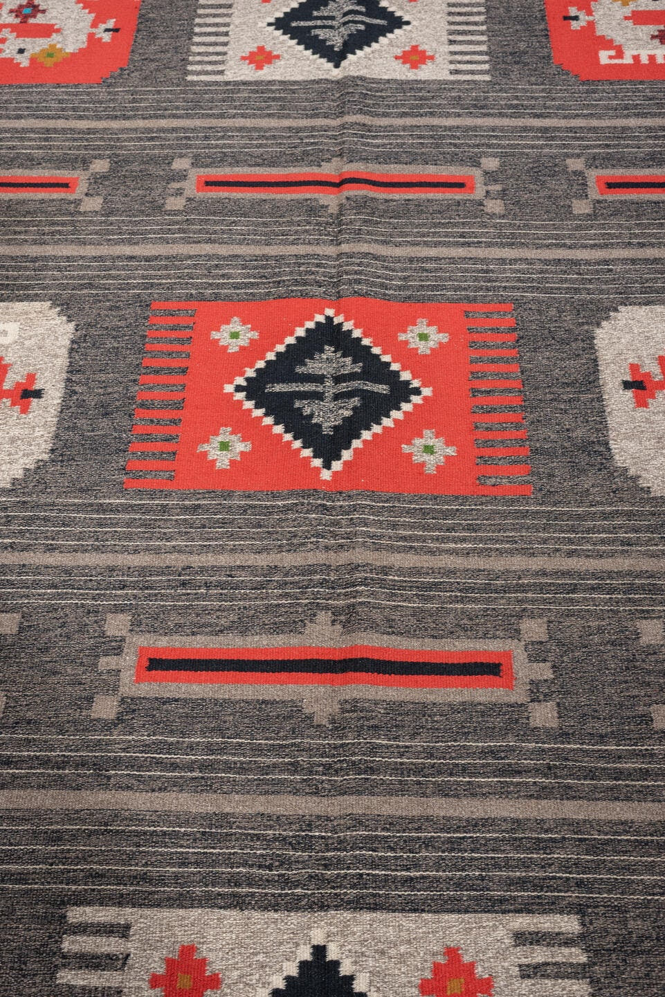 5' x 7' one-of-a-kind handmade antique Scandinavian medium size rug. Color palette: charcoal, coral, ivory, black, taupe