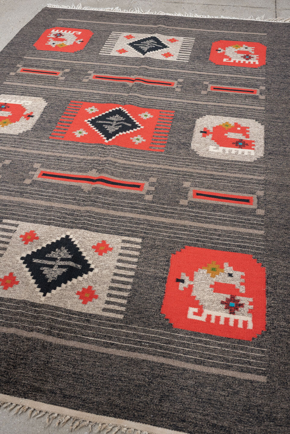 5' x 7' one-of-a-kind handmade antique Scandinavian medium size rug. Color palette: charcoal, coral, ivory, black, taupe