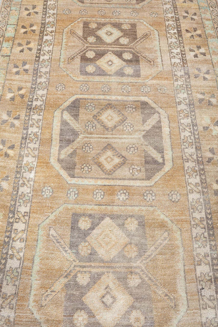 3' x 10' one-of-a-kind handmade antique Anatolian runner rug. Color palette: camel, ivory, taupe, charcoal, sage, terracotta