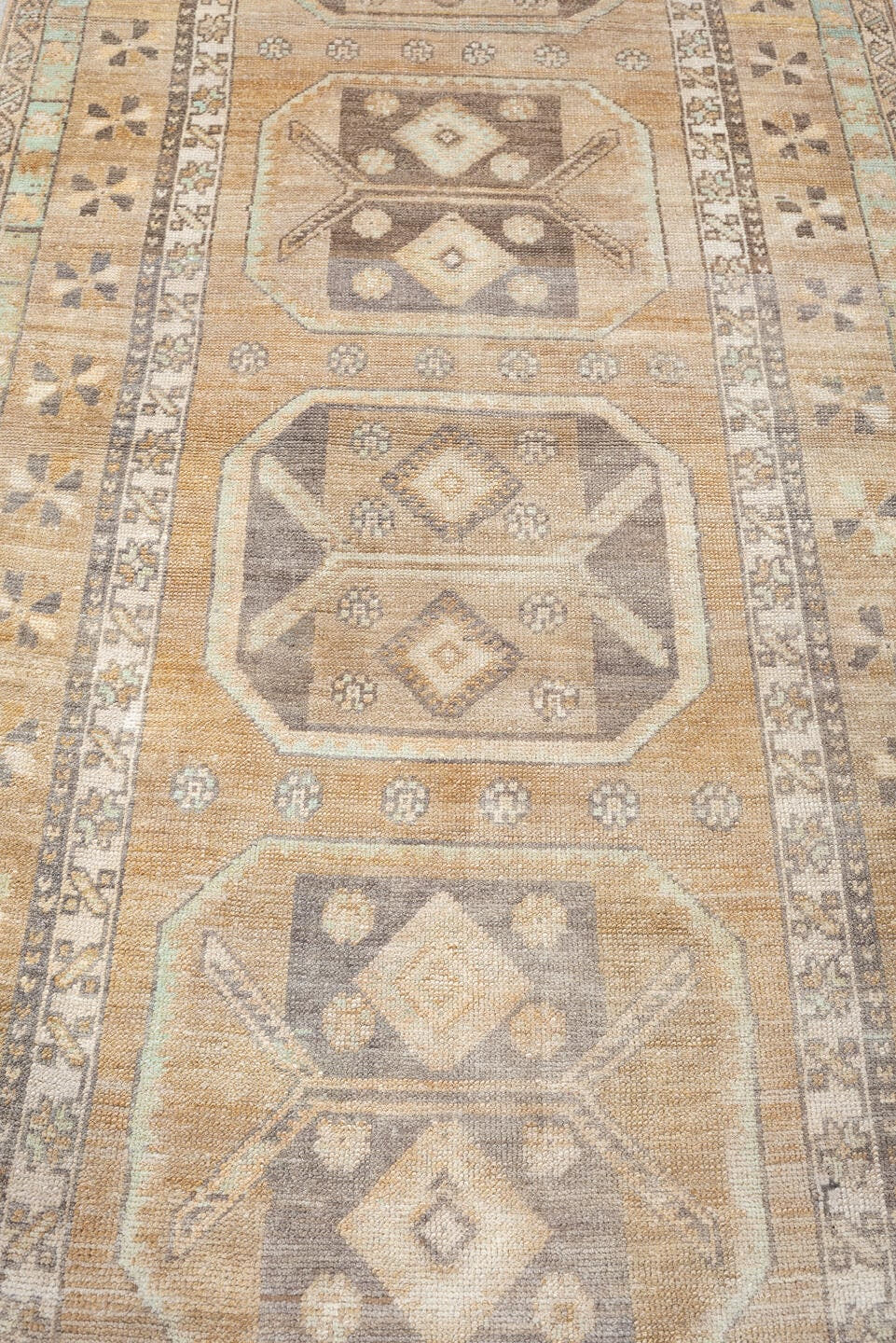 3' x 10' one-of-a-kind handmade antique Anatolian runner rug. Color palette: camel, ivory, taupe, charcoal, sage, terracotta