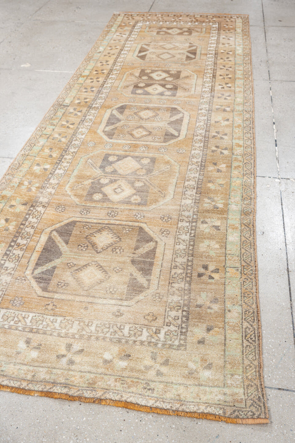 3' x 10' one-of-a-kind handmade antique Anatolian runner rug. Color palette: camel, ivory, taupe, charcoal, sage, terracotta