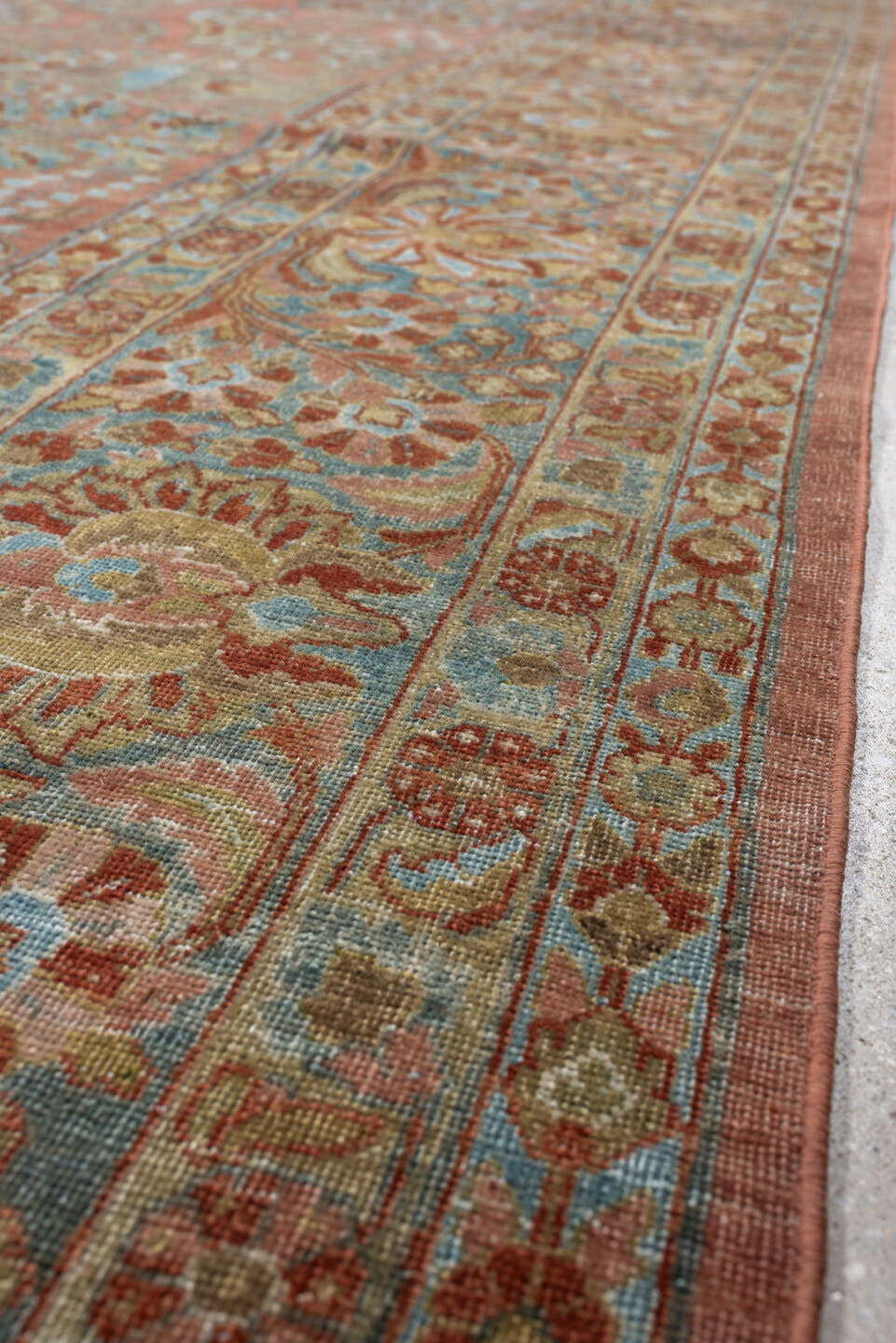 10' x 14' one-of-a-kind handmade antique Sarouk large size rug. Color palette: rose, teal, ivory, sage, rust, tan, coral