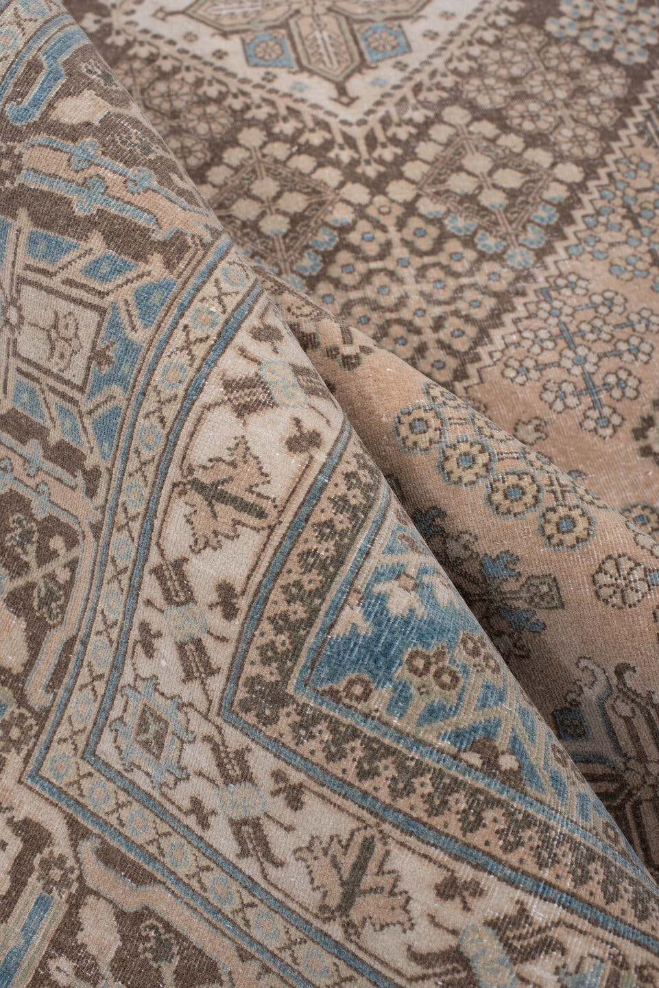 7' x 10' one-of-a-kind handmade antique Joshegan large size rug. Color palette: ivory, taupe, powder blue, charcoal, beige