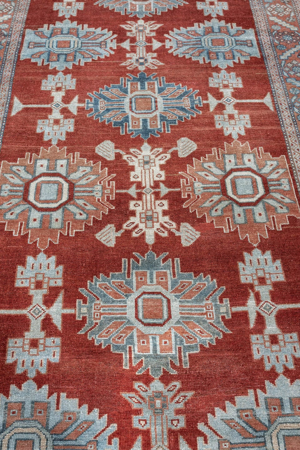 3' x 10' one-of-a-kind handmade antique Malayer runner rug. Color palette: rust, pale blue, ivory, terracotta, charcoal