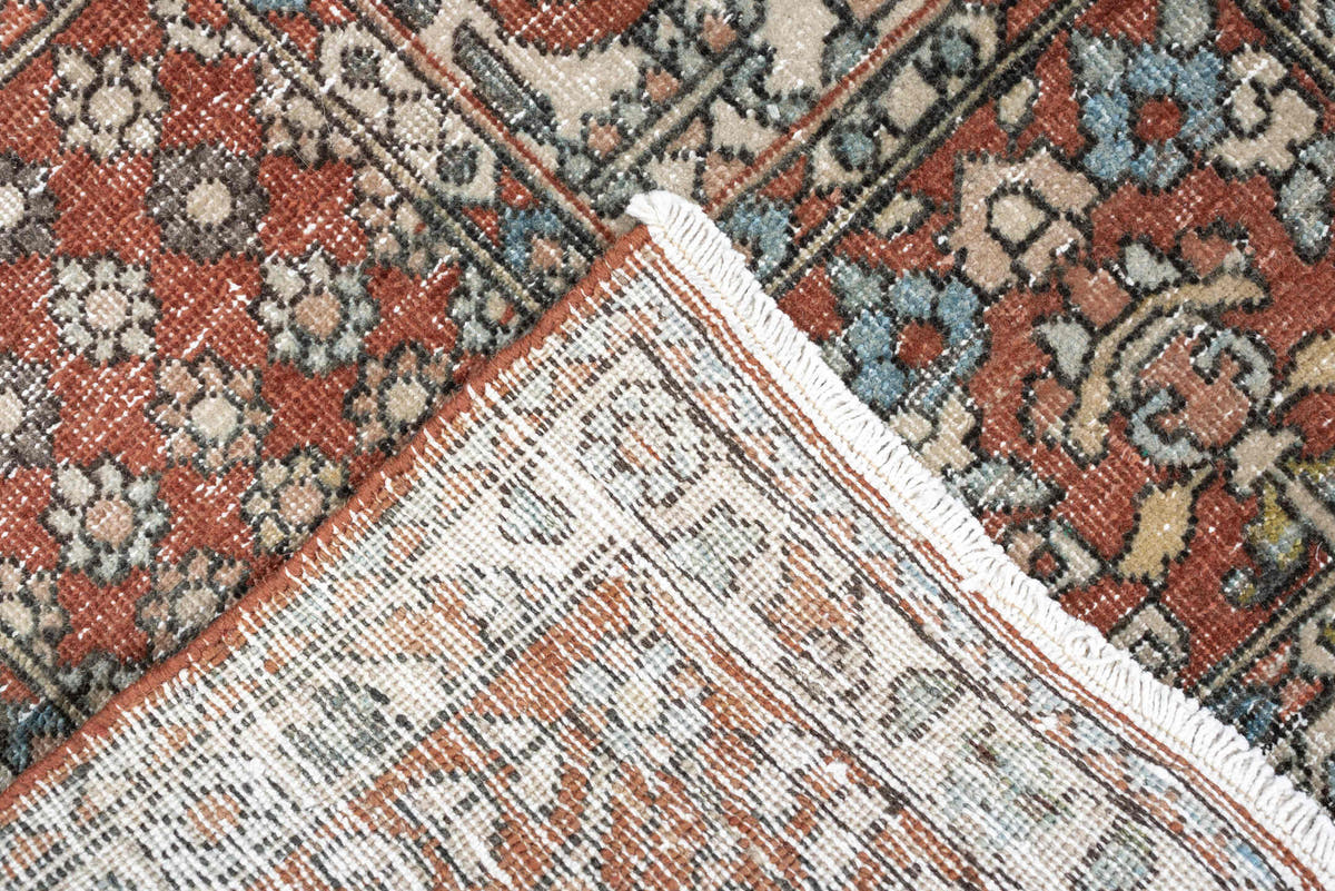 5' x 8' one-of-a-kind handmade antique Baktiary medium size rug. Color palette: terracotta, ivory, charcoal, slate blue