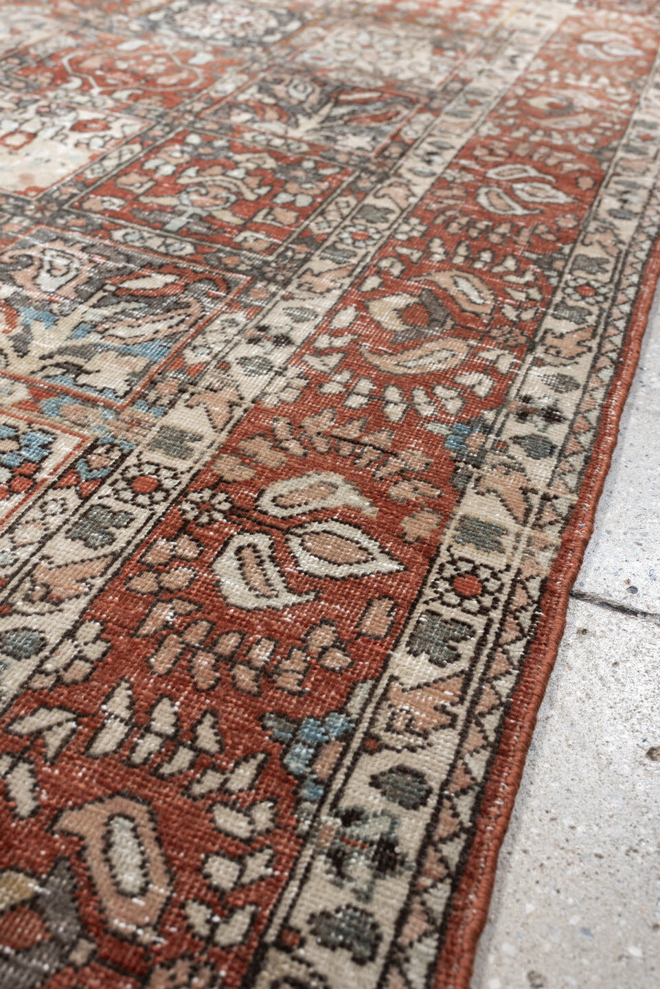 5' x 8' one-of-a-kind handmade antique Baktiary medium size rug. Color palette: terracotta, ivory, charcoal, slate blue