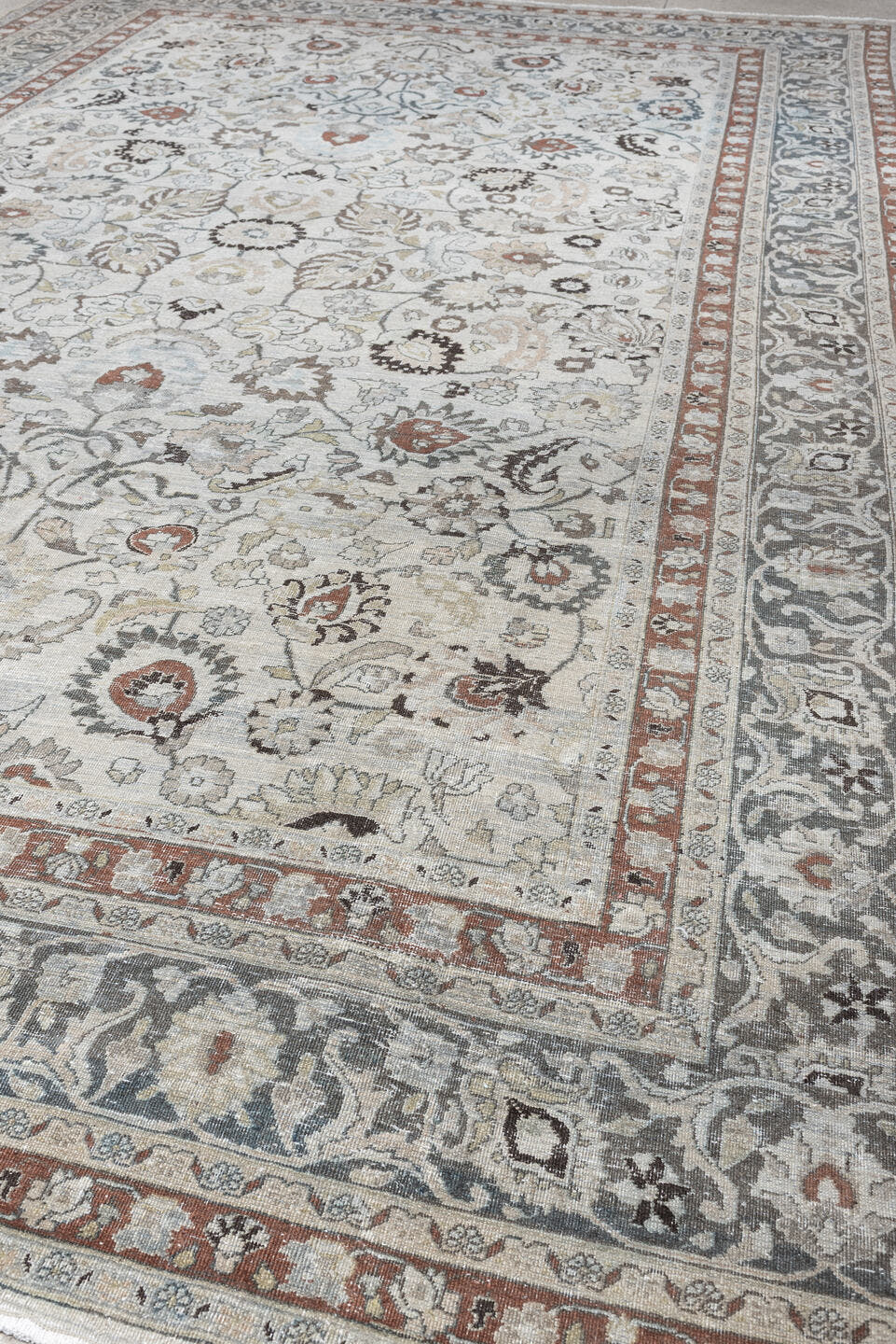 10' x 16' one-of-a-kind handmade antique Meshed rug. Color palette: ivory, slate blue, terracotta, taupe, charcoal, cream
