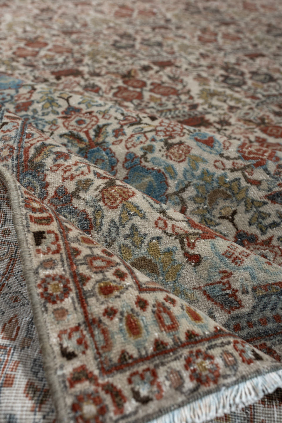 7' x 10' one-of-a-kind handmade antique Varamin large size rug. Color palette: ivory, rust, muted teal, sage, charcoal