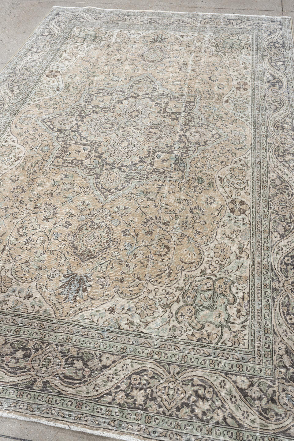 5' x 8' one-of-a-kind handmade antique Tabriz medium size rug. Color palette: ivory, taupe, charcoal, stone, sage, camel