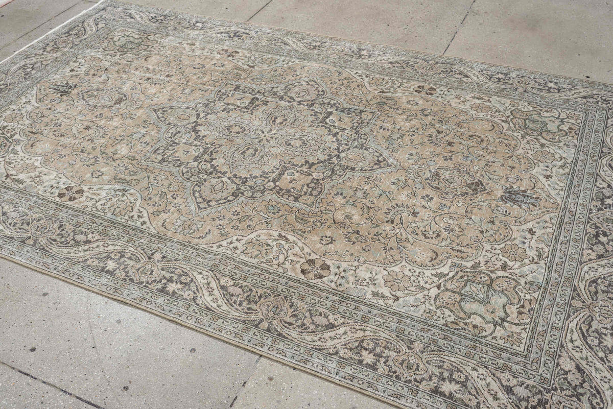 5' x 8' one-of-a-kind handmade antique Tabriz medium size rug. Color palette: ivory, taupe, charcoal, stone, sage, camel