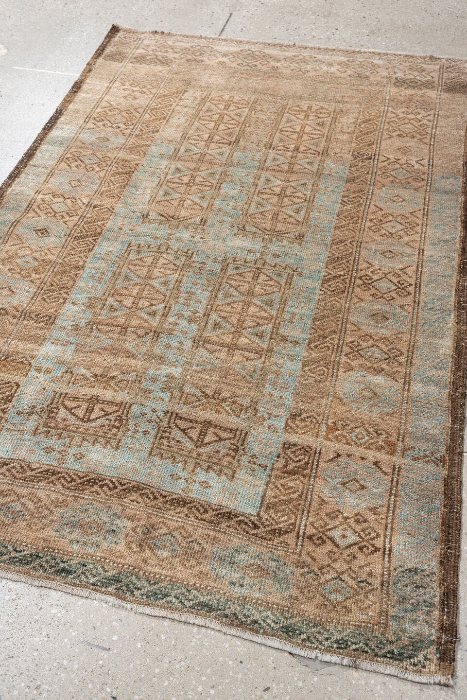 3' x 5' one-of-a-kind handmade antique Belouch small size rug. Color palette: camel, taupe, pale blue, ivory, brown, slate
