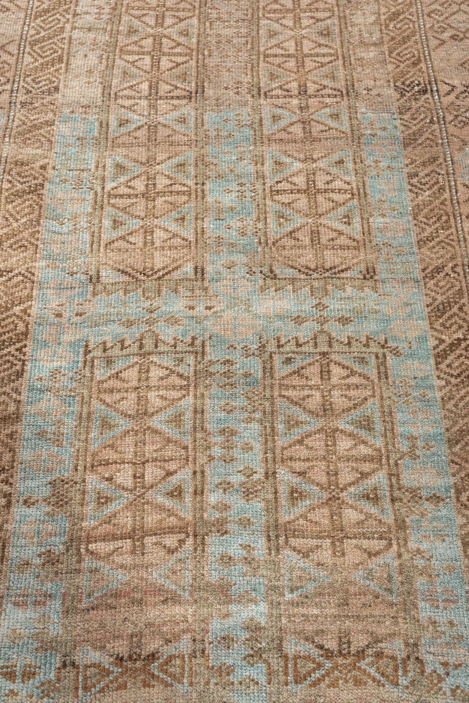3' x 5' one-of-a-kind handmade antique Belouch small size rug. Color palette: camel, taupe, pale blue, ivory, brown, slate