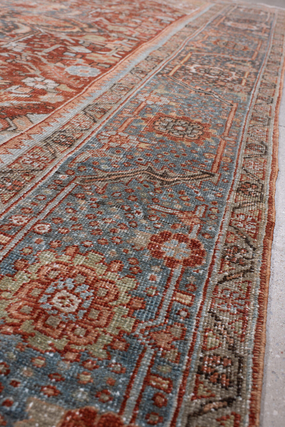 8' x 11' one-of-a-kind handmade antique Heriz large size rug. Color palette: rust, powder blue, ivory, navy, terracotta