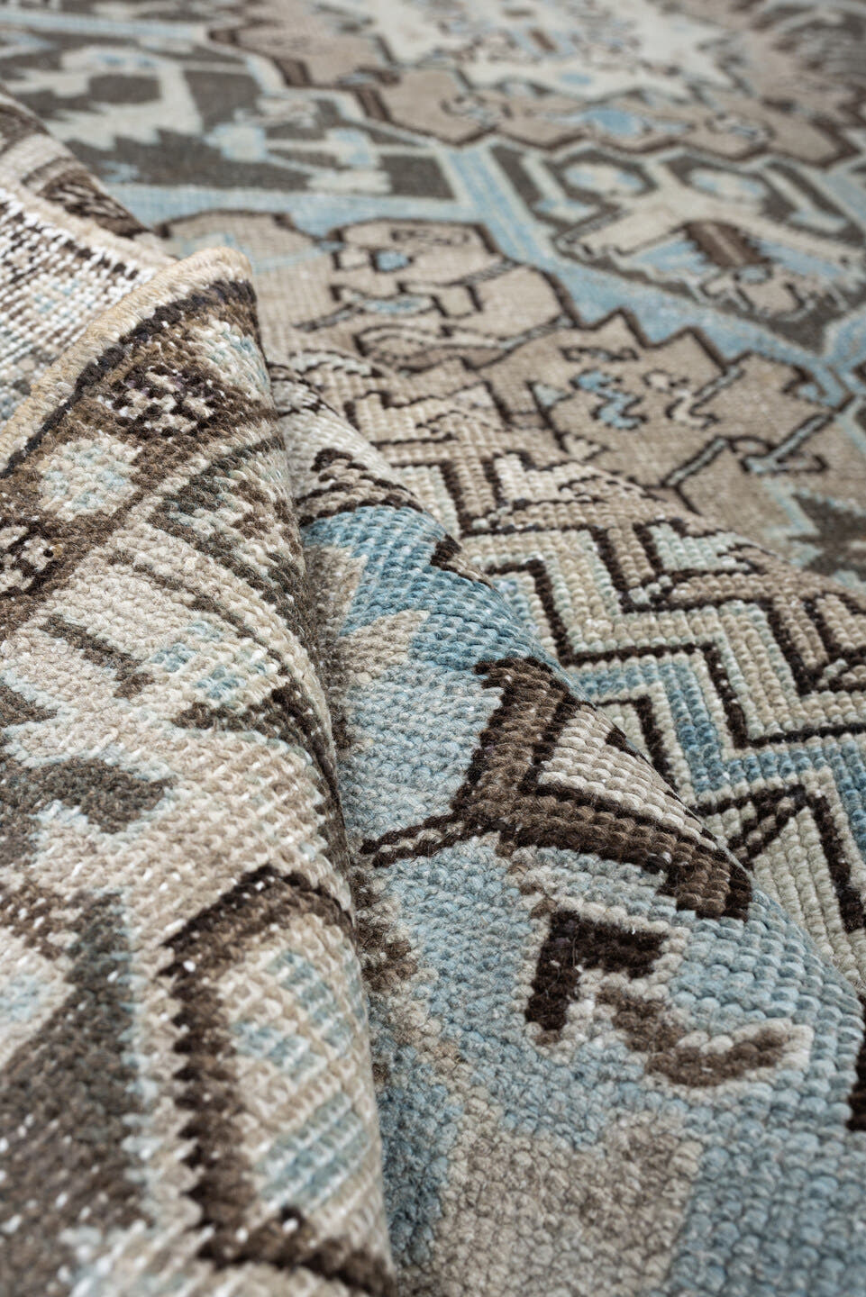 7' x 11' one-of-a-kind handmade antique Heriz large size rug. Color palette: ivory, taupe, charcoal, slate blue, dark brown
