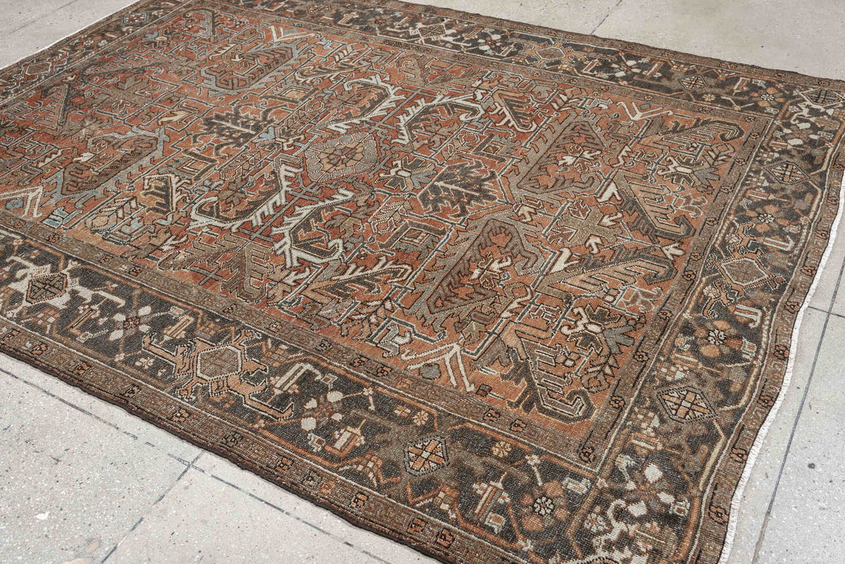 6' x 8' one-of-a-kind handmade antique Heriz medium size rug. Color palette: terracotta, charcoal, ivory, taupe, sage, slate
