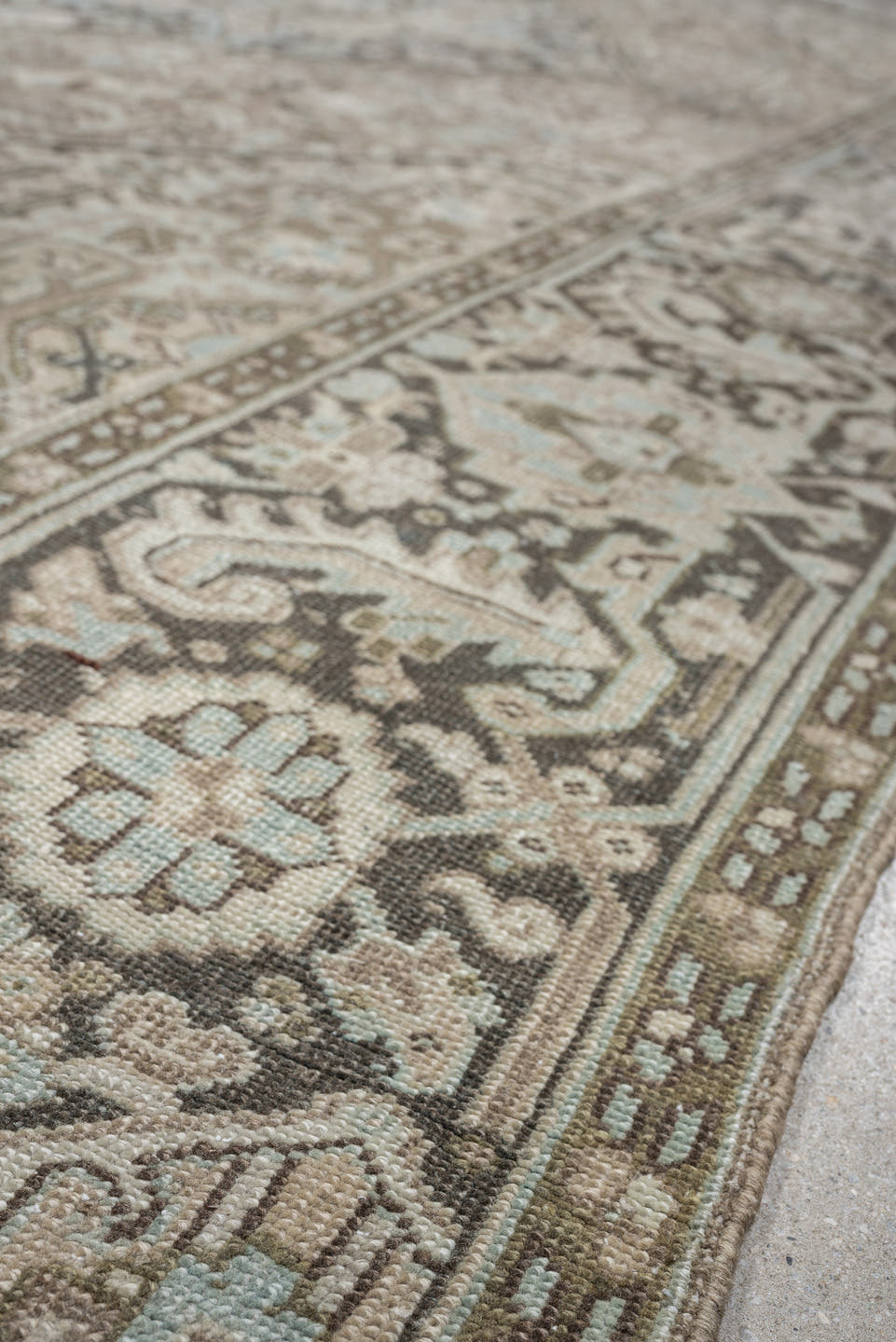 8' x 11' one-of-a-kind handmade antique Heriz large size rug. Color palette: taupe, ivory, charcoal, pale blue, camel, slate