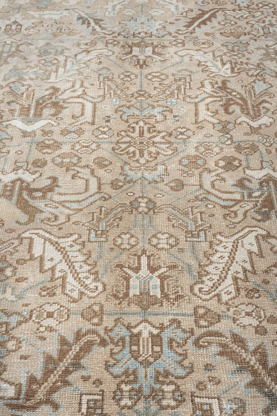 7' x 10' one-of-a-kind handmade antique Heriz large size rug. Color palette: taupe, brown, ivory, pale blue, charcoal, slate