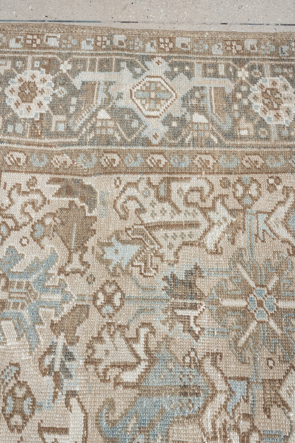 7' x 10' one-of-a-kind handmade antique Heriz large size rug. Color palette: taupe, brown, ivory, pale blue, charcoal, slate