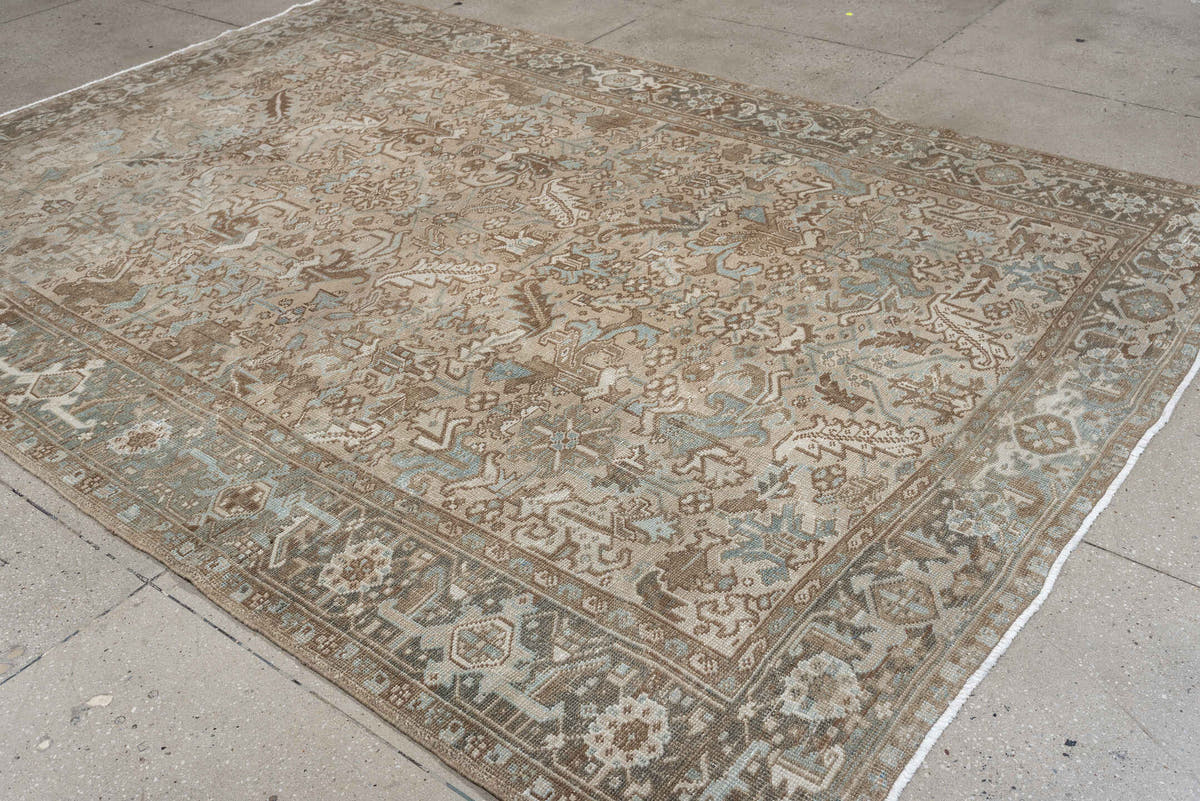 7' x 10' one-of-a-kind handmade antique Heriz large size rug. Color palette: taupe, brown, ivory, pale blue, charcoal, slate
