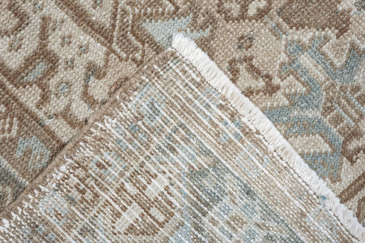 7' x 10' one-of-a-kind handmade antique Heriz large size rug. Color palette: taupe, brown, ivory, pale blue, charcoal, slate