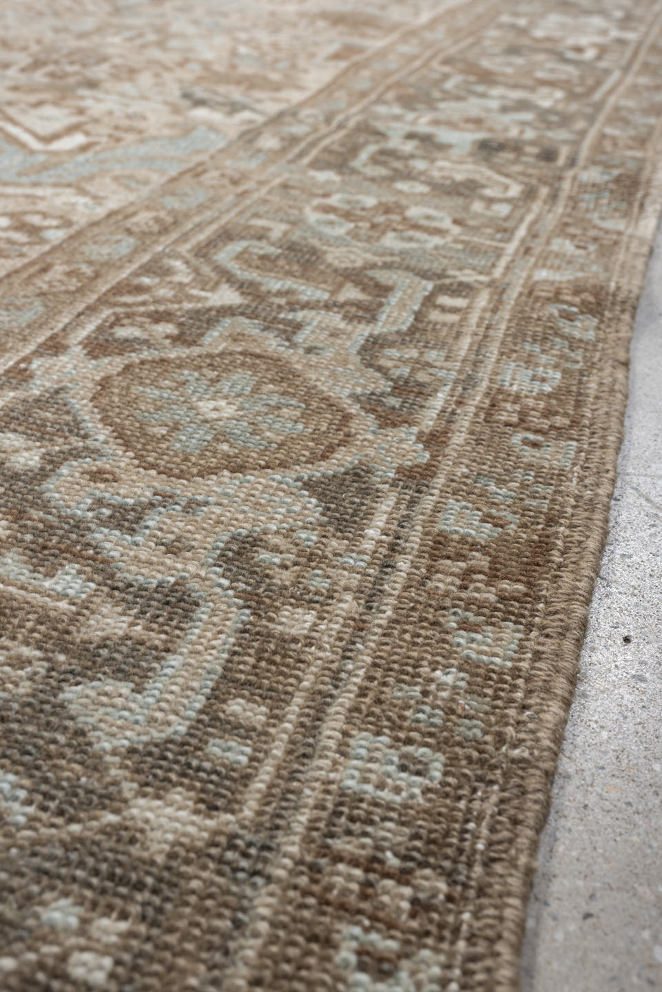 7' x 10' one-of-a-kind handmade antique Heriz large size rug. Color palette: taupe, brown, ivory, pale blue, charcoal, slate