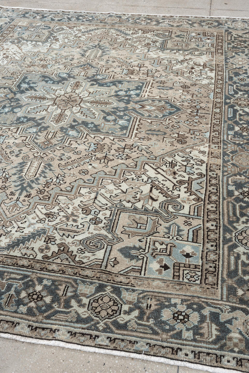 7' x 8' one-of-a-kind handmade antique Heriz rug. Color palette: ivory, blue gray, taupe, slate, brown, charcoal, sage