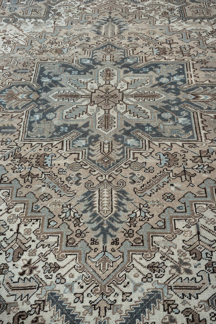 7' x 8' one-of-a-kind handmade antique Heriz rug. Color palette: ivory, blue gray, taupe, slate, brown, charcoal, sage