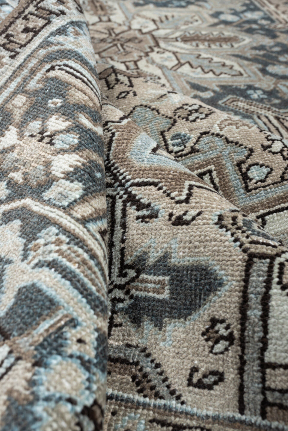 7' x 8' one-of-a-kind handmade antique Heriz rug. Color palette: ivory, blue gray, taupe, slate, brown, charcoal, sage