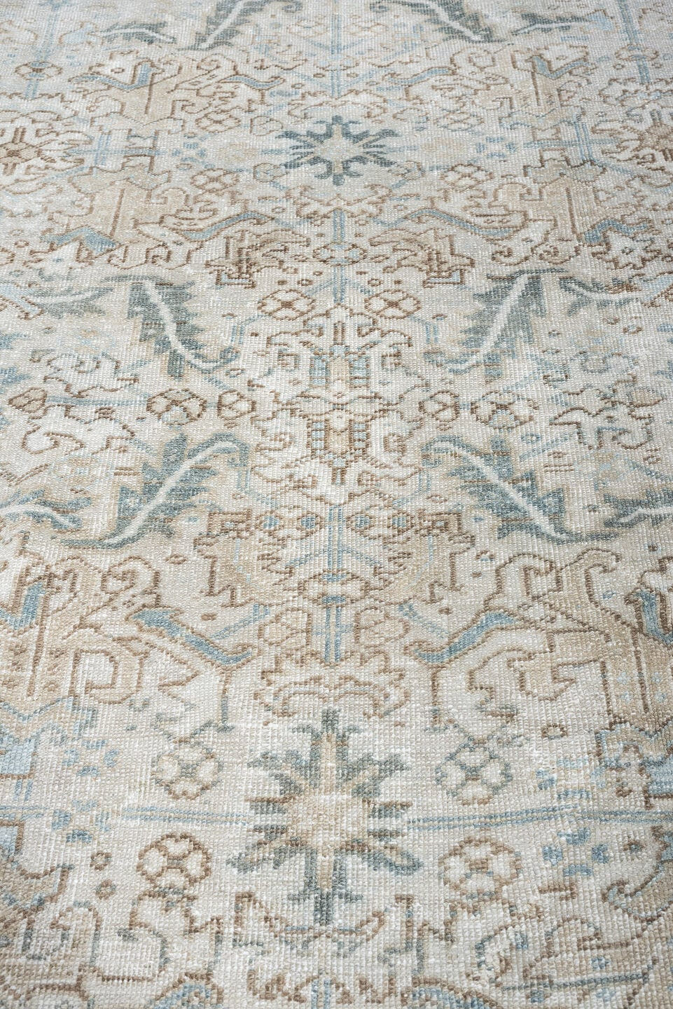 7' x 8' one-of-a-kind handmade antique Heriz rug. Color palette: ivory, pale blue, sage, taupe, blue gray, beige, charcoal