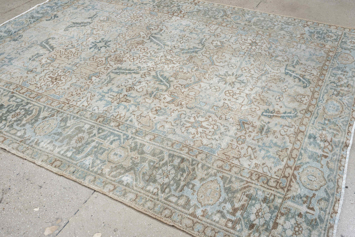 7' x 8' one-of-a-kind handmade antique Heriz rug. Color palette: ivory, pale blue, sage, taupe, blue gray, beige, charcoal