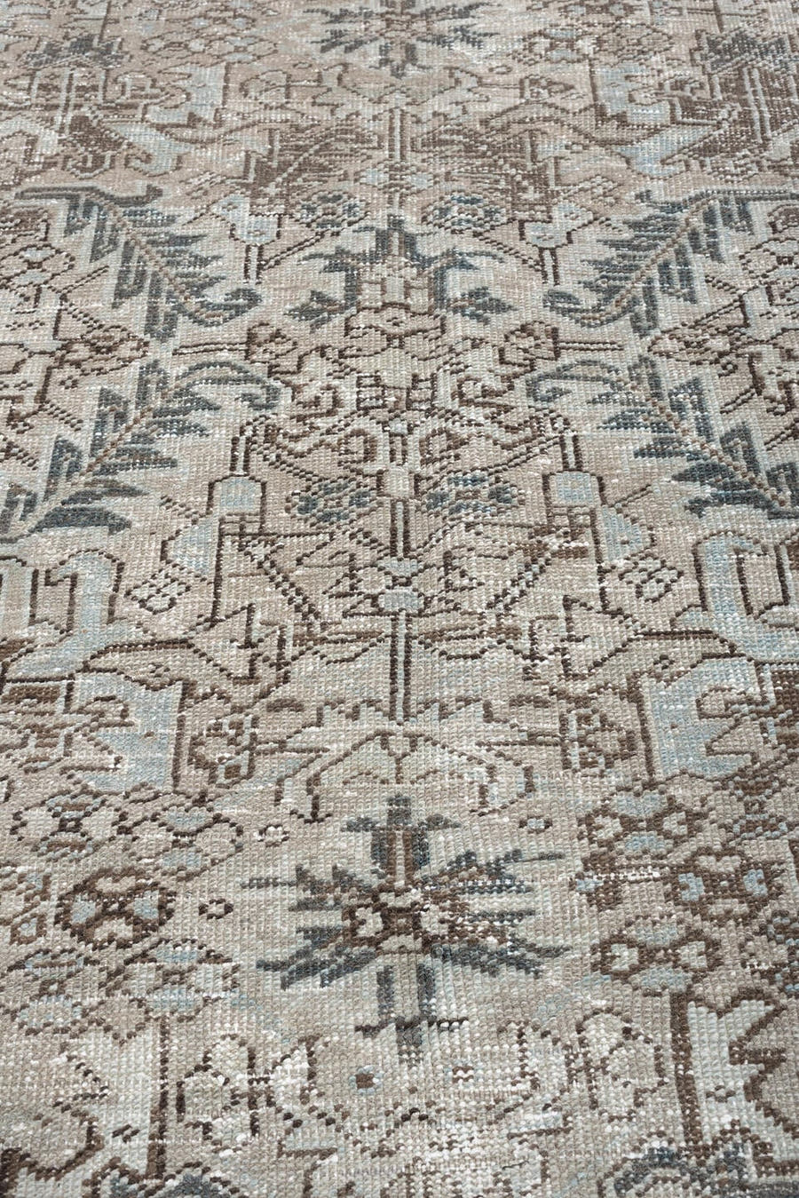 6' x 8' one-of-a-kind handmade antique Heriz rug. Color palette: ivory, taupe, charcoal, gray, beige, slate, brown, black