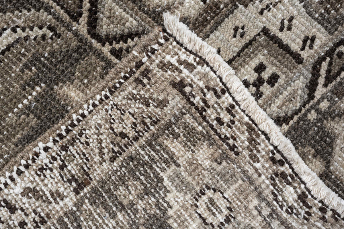 9' x 13' one-of-a-kind handmade antique Heriz large size rug. Color palette: taupe, ivory, charcoal, brown, slate, camel