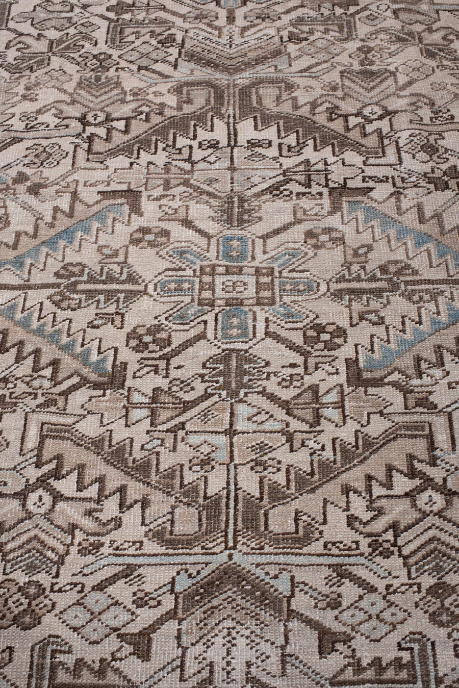 7' x 11' one-of-a-kind handmade antique Heriz large size rug. Color palette: ivory, blue gray, taupe, chocolate brown, slate
